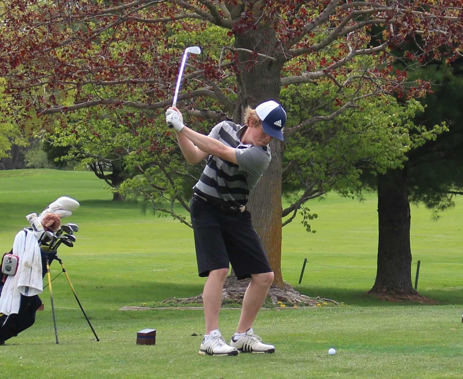 Grand Rapids CC Golfer tees off at the MCCAA Golf Championship