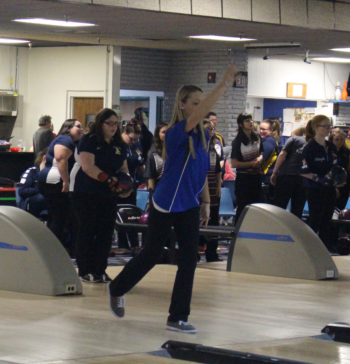 A member of Muskegon CC's women's bowling team during warm ups of the Kirtland CC Invitational