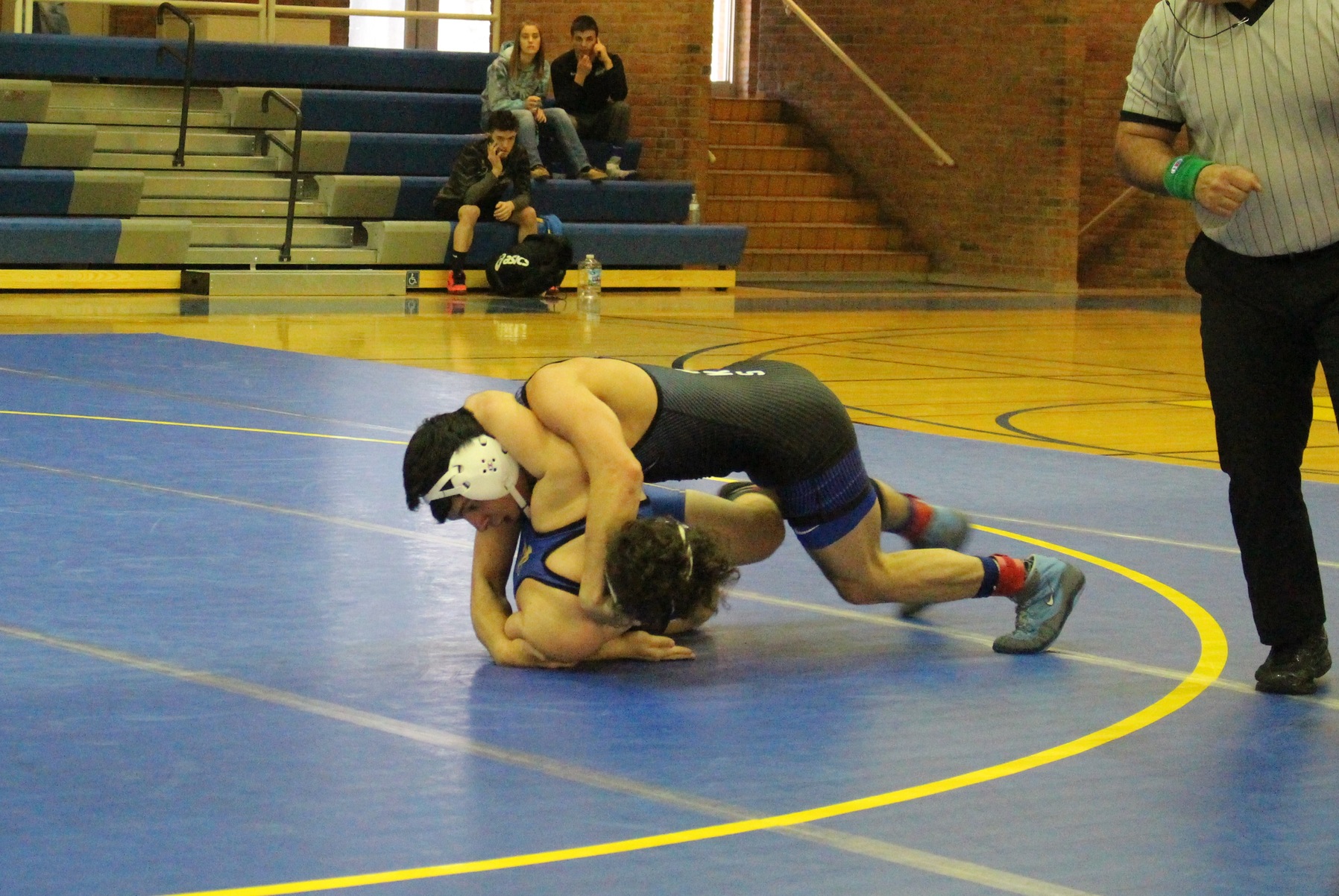 Henry Ford Wrestler goes for a pin