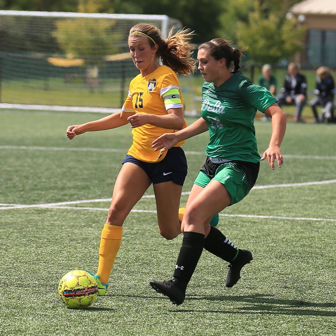 Delta College and Schoolcraft College players battle for the ball