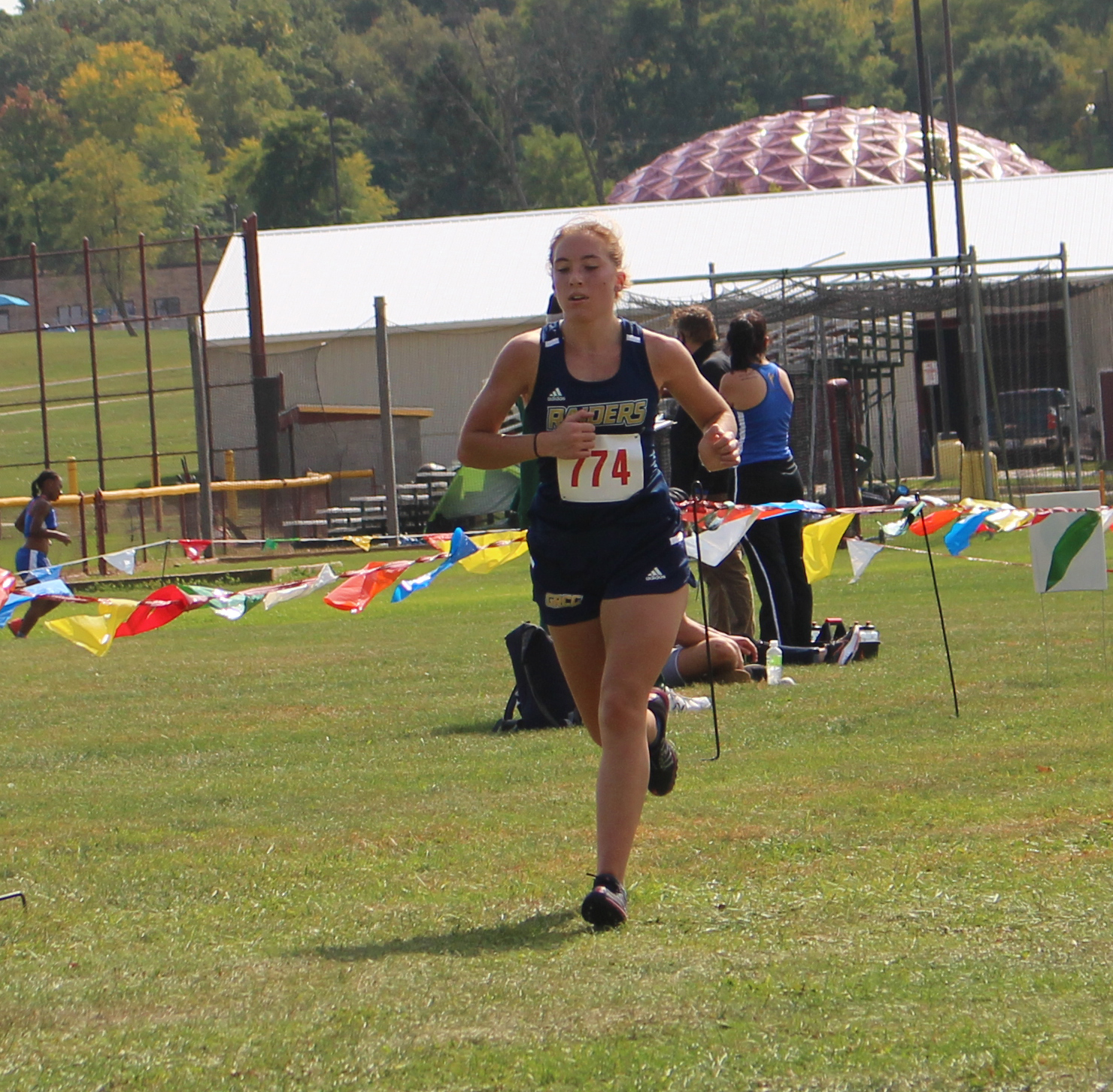 Audrey Meyering of Grand Rapids runs at the Jackson College Jets Classic